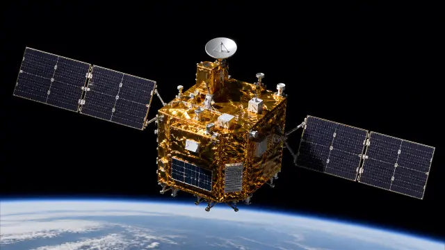 Satélite dorado flotando sobre la Tierra