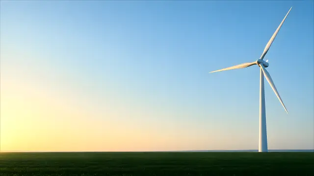 Turbina eolica futurista en pradera al amanecer