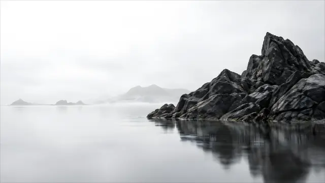Paisaje abstracto de rocas en el mar con niebla minimalista