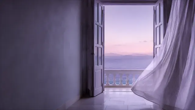 Puerta abierta al mar con atardecer y cortinas al viento