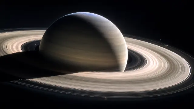 Saturno con anillos en el espacio profundo